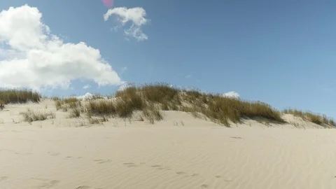 View of sand dune with blue sky Stock Footage 80760978