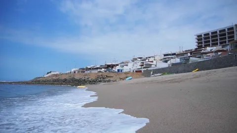 View from the sand walking on the seashore on the beach and with the waves Stock Footage 195125767