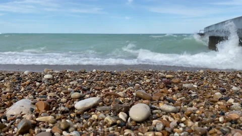 View from the sand of waves coming in from Lake Michigan Stock Footage 153819457