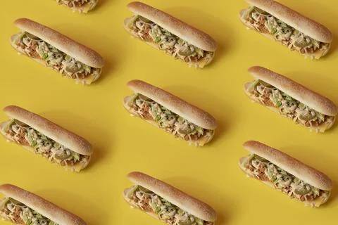 View of sandwiches with salad in a form of a pattern looking delicious on a plai Foto stock