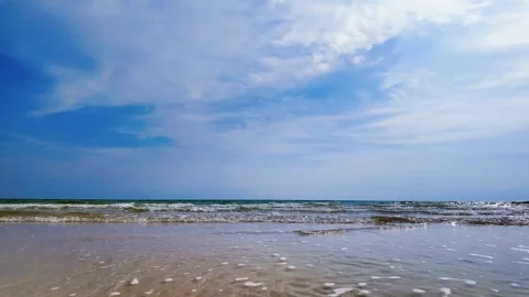 View of sandy beach, sea and sky in summer Stock Footage 274834054