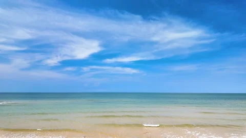 View of sandy beach, sea and sky in summer Stock Footage 274834061