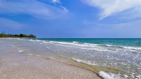 View of sandy beach, sea and sky in summer Stock Footage 274834071