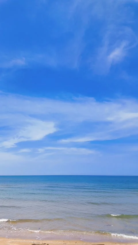 View of sandy beach, sea and sky in summer Stock Footage 274834155