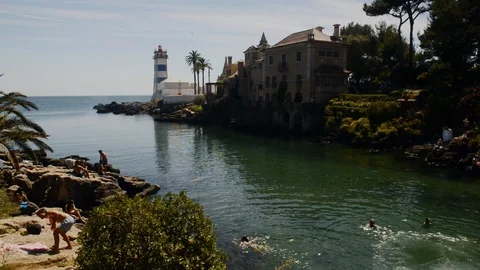 View of Santa Marta lighthouse and Municipal museum of Cascais, in Portugal with Stock Footage 114983513
