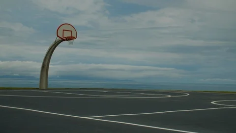 View of a scenic basketball court on a ocean shore. No people. 4K UHD Stock Footage