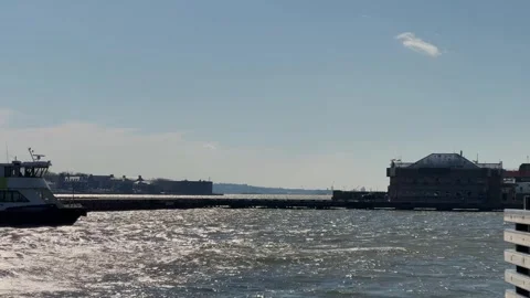 View of the scenic harbor featuring a ferry on a beautifully sunny day Video stock 295077287