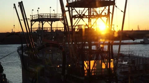 The view from the scratched window of the oil terminal at sunset. Stock Footage 140362234