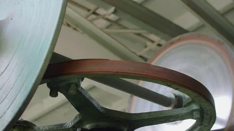 View of screw of old screw machine in metal workshop from top to bottom Stock Footage 95894081