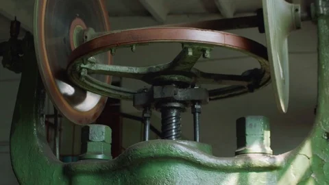 View of screw of old screw press machine in metal workshop Stock Footage 95852769