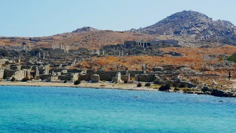 View from the sea of the ancient monuments and ruins on the sacred island of  Video stock 247626340