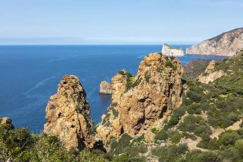 View of the sea and cliffs, pointy rocks, sardinia, italy Stock Photos