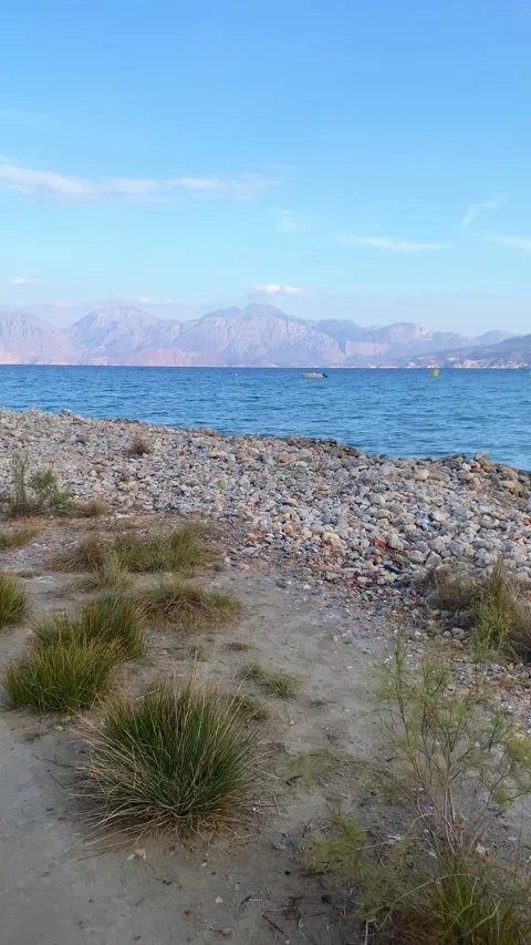 A view of the sea and mountains. Vertical video for social media Stock Footage 287341971