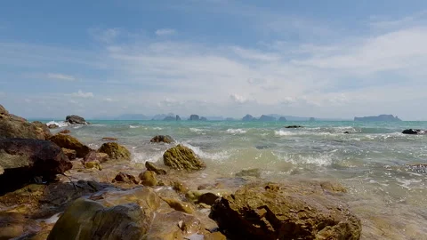 View on sea and waves with beautiful islands in Background Stock Footage 327774018