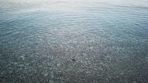 View of the sea from the beach, waves of the transparent and crystalline sea Stock-Footage 278233453
