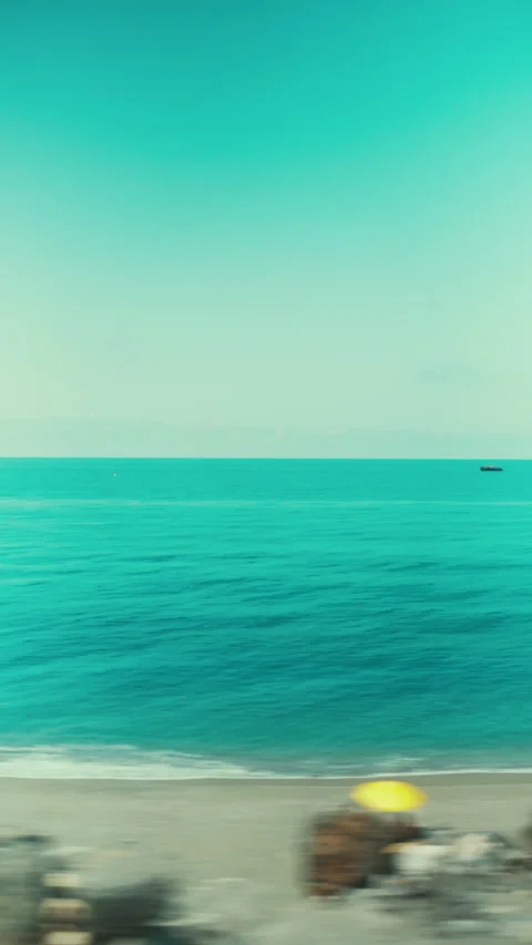 View of the sea in Calabria in summer from a train window outside Stock Footage 340272253
