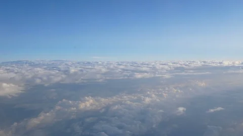 View of a sea of cloud from the porthole of a liner airplane Stock-Footage 90742227