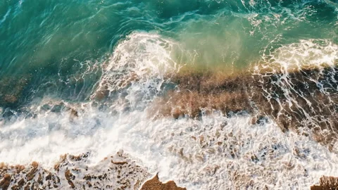 View of sea coast from the top. Rough sea, waves with foam Stock Footage 145169267