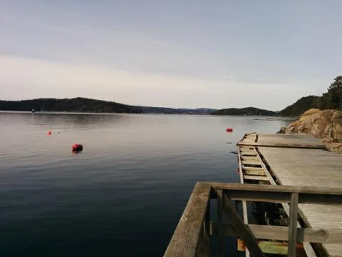 View of the sea from the docks Stock Photos