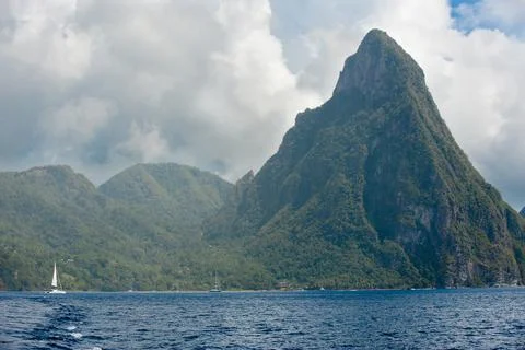 View from sea of one of the two pitons on Caribbean Island of St Lucia Stock Photos