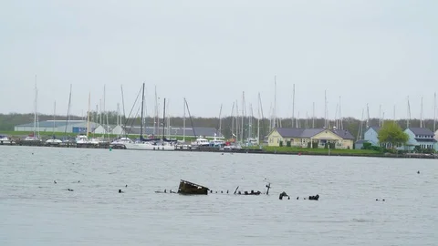 View of the sea with the sinking object in the middle Video stock 80629716