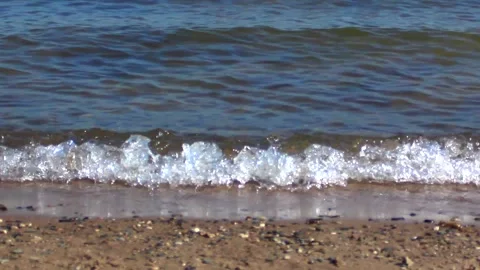 A view of the sea with small waves, the coast. The beach is transparent waves Stock Footage 169881597