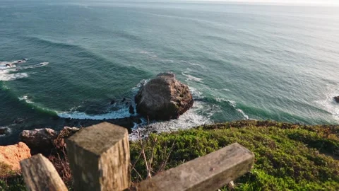 View of Sea Stack from Cliffside Fence at Chimney Rock, Point Reyes Stock Footage 322682178