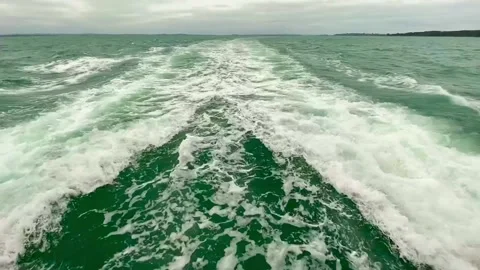 View of sea surface and waves from ferry. Red ferry between Auckland and Waiheke Stock Footage 138033890