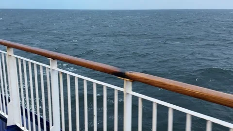 View of sea surface from ship side at overcast morning Stock Footage 345663749