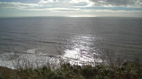 View of the Sea through grass on the cliff tops. Video stock 47762171
