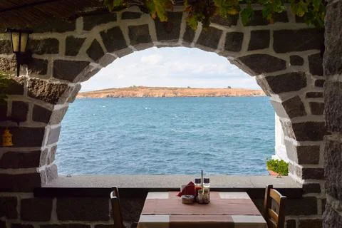 View of sea through window of a cafe Stock Photos