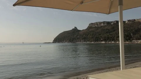 View of the sea from under the umbrella's beach Stock Footage 71615993