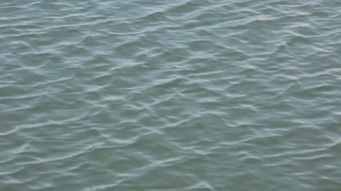 View on sea water small waves from light wind Видео 290433535