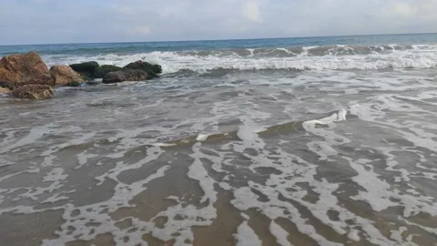 View of sea waves from the beach in Mediterranean sea, Calafell  ,Spain Stock Footage 133027913