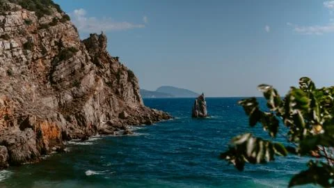 View of sea waves hitting rocks Stock Photos