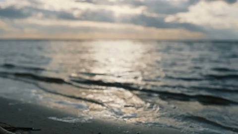 A view of the sea with waves, the rays of the sun through clouds. landscape 库存影片 91552261