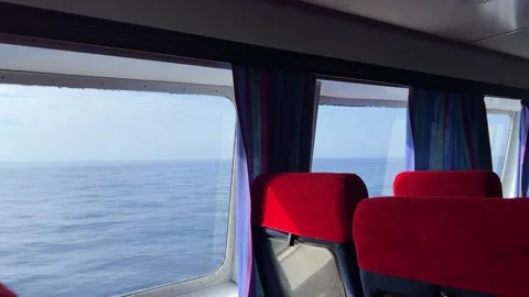 View of the sea from the window of a fast moving sea ferry Stock Footage 252718950