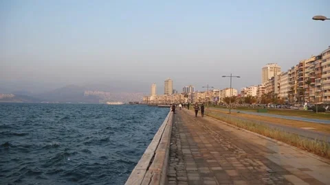 View Of The Seafront In A Big City With People Walking Along The Promenade Stock Footage 195929426