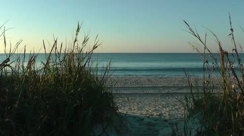 View of seashore from path through a sand dune Stock Footage 11058773