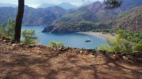 View from seaside mountain peak to beautiful sea lagoon with the ship Stock Footage 59777566