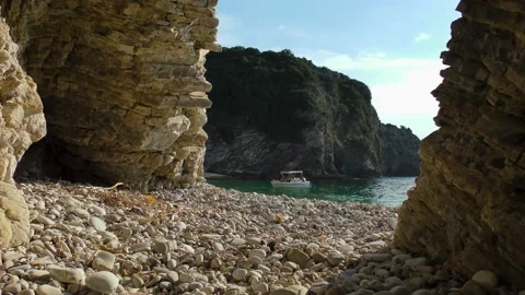 View of a secluded beach and a small touristic boat Corfu, Greece Stock Footage 134646647