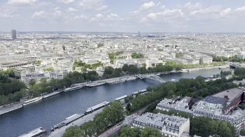 View from second floor of Eiffel Tower overlooking Paris skyline in France Stock Footage 337196787
