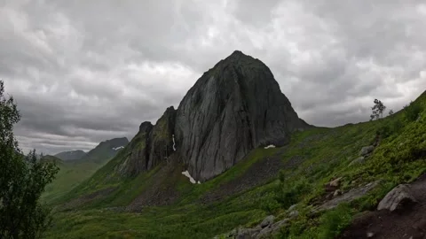 View of Segla mountain peak with hiking trail and birch trees in Senja Norway 库存影片 342059385
