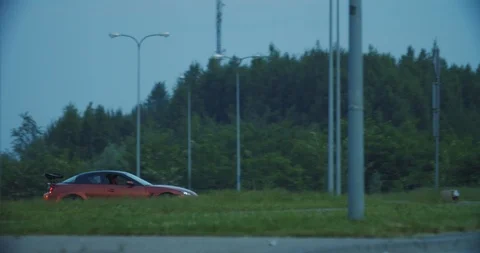 View of self-willed young man driving on modern sports car from the police Stock Footage 112953860