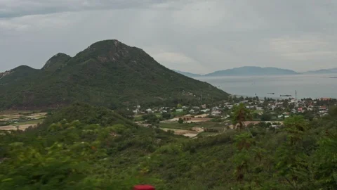 View of Separated Rural Peasant Fields against Sea Hill Stock Footage 109307503