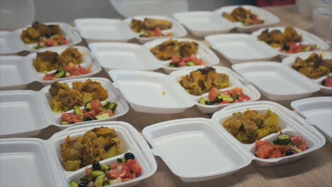 View of served plastic containers with take away meals Stock Footage 154997211