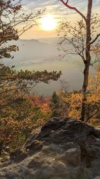View of the setting sun from Lilienstein hill. Atmospheric beautiful landscap Stock Photos