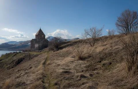 View on Sevanavank Monastery near of Sevan Lake and snowy mountains Stock Photos