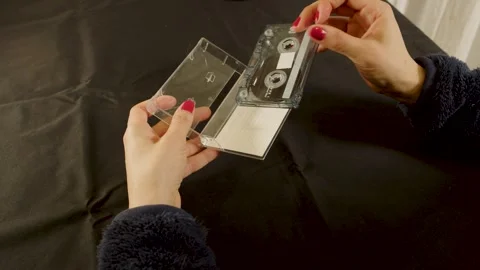 View of several vintage audio cassettes on a table. Stock Footage 327687601