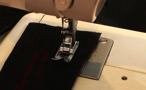 View of sewing machine needle and other parts Stock Photos